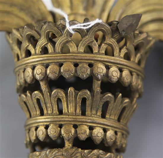 A Sino-Tibetan bronze model of the Buddhist emblem of a parasol, width 34.5cm